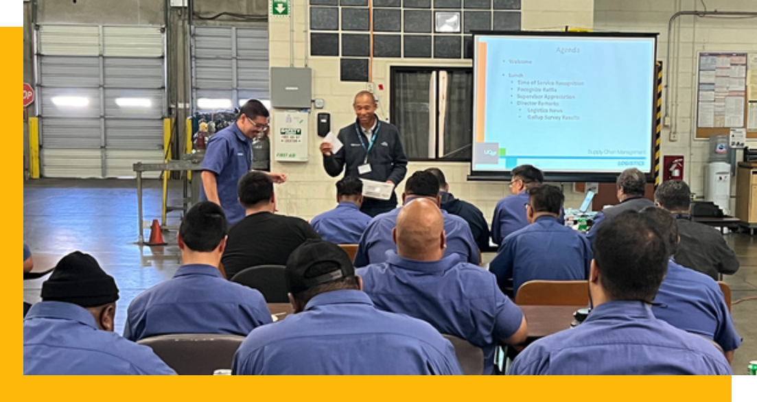 Mel addressing his team at the quarterly Logistics Appreciation luncheon