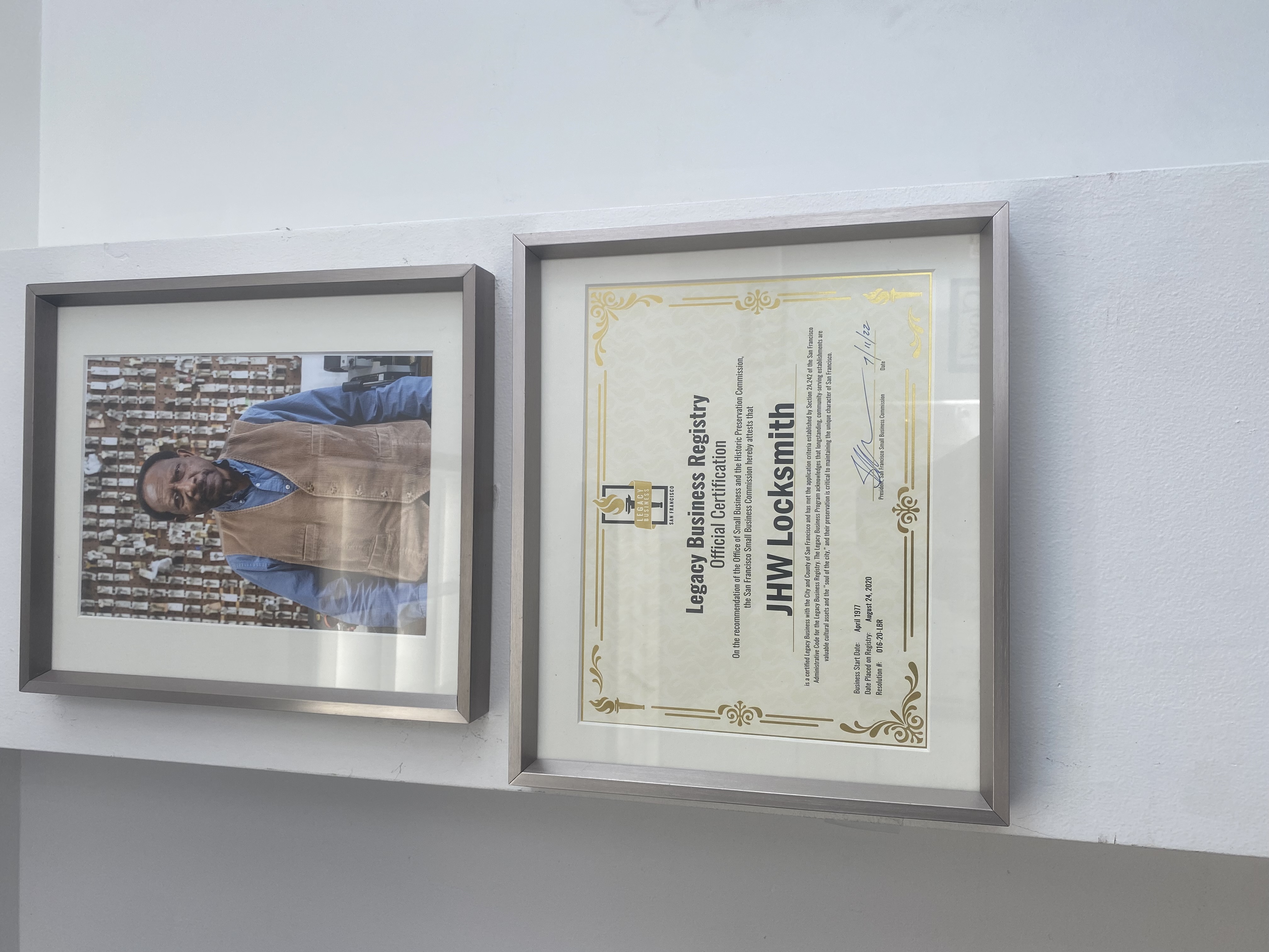 JW Locksmith's Legacy Business certificate hanging in the lockshop