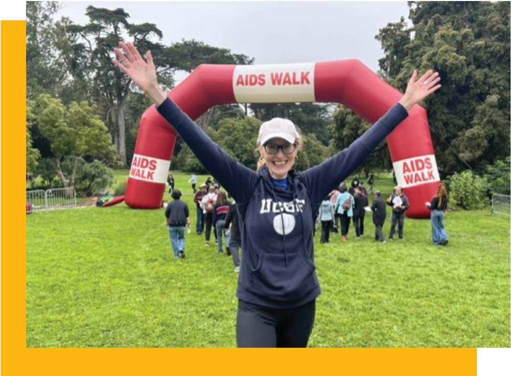 Mary Anne Hallacy at the 2025 SF AIDS Walk finish line, celebrating 
